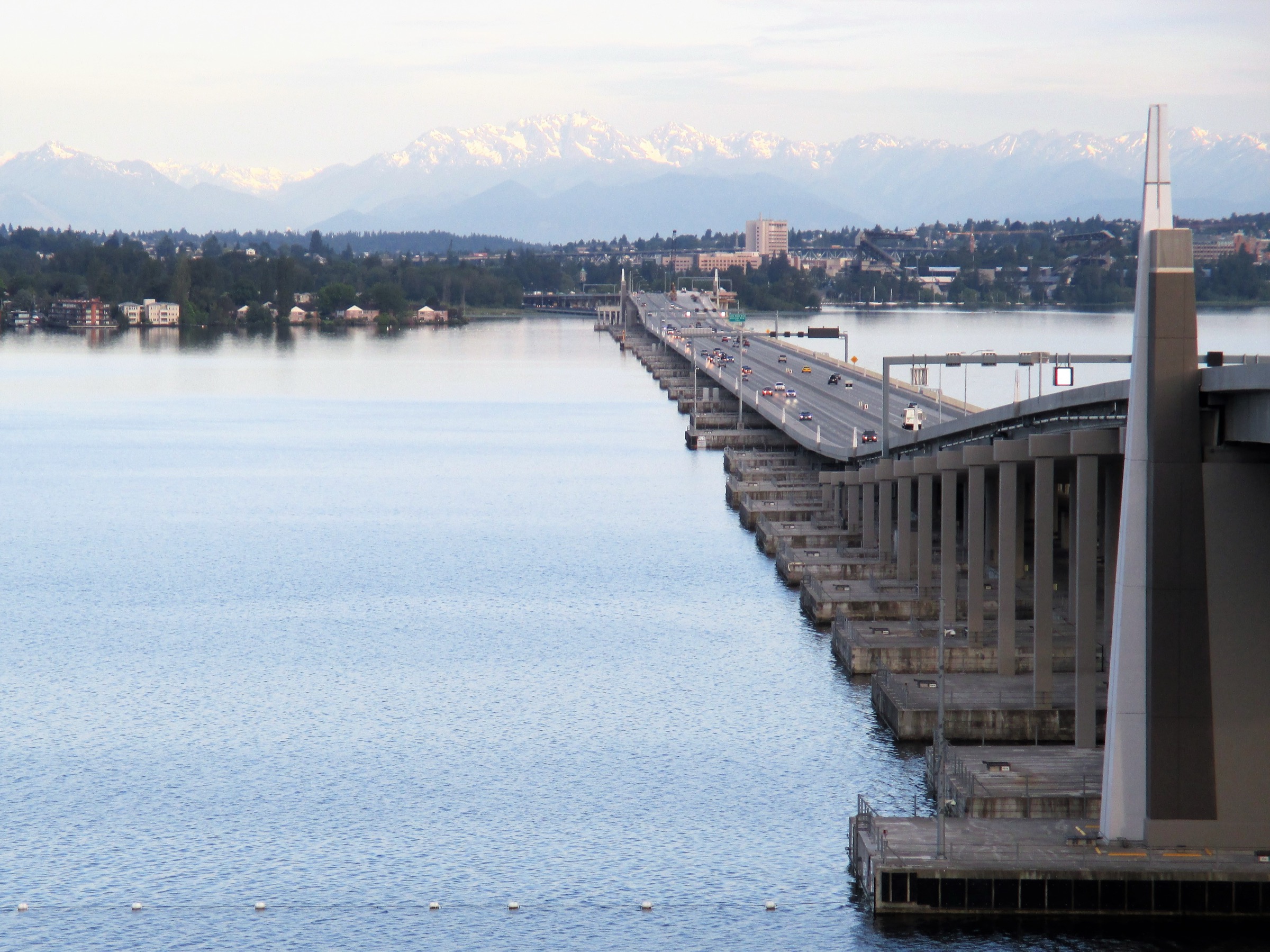 SR 520 floating bridge across Lake Washington with the Olympic Mountains in the background